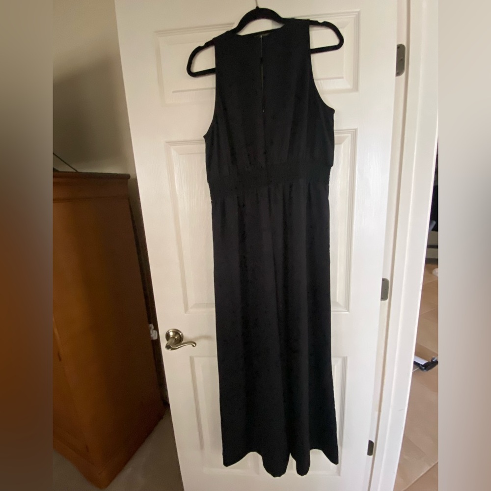 Ann Taylor black one piece pantsuit with defined waist. Worn once.